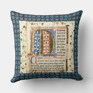 illuminated manuscript pillow with blue background