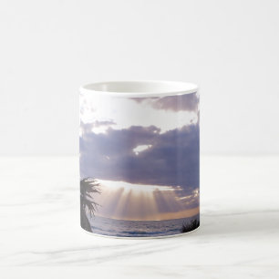 Illuminated ocean in the early morning coffee mug