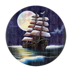 Illuminated Ship on the Ocean under the Moon Cutting Board