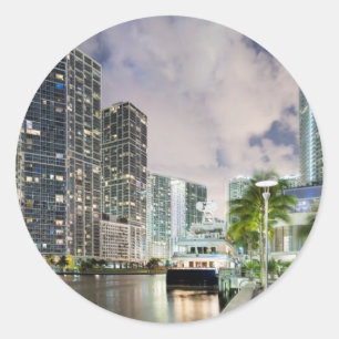 Illuminated towers at the Miami River waterfront Classic Round Sticker