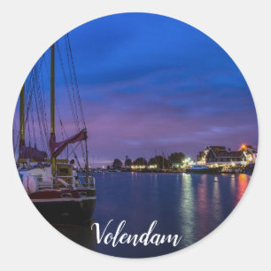 Illuminated Volendam harbor at night Classic Round Sticker
