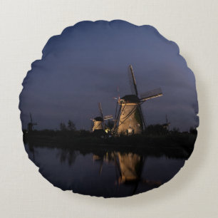 Illuminated windmill at Blue Hour round pillow
