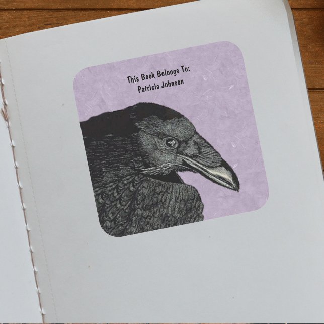 Illustration of Face of Black Crow Marbled Purple Square Sticker (Head wing of black crow on marbled purple on bookplate ownership label sticker.)