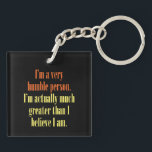 I'm a very humble person key ring<br><div class="desc">Egotistic or Realistic? You be the judge! Reads "I'm a humble person. I'm actually much greater than I think I am." Other colours are available.</div>