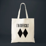 I'm Difficult Skiing Double Diamond Slopes Gag Tote Bag<br><div class="desc">This eye-catching novelty tote bag is a must-have for any skiing enthusiast who isn't afraid to show their passion. The bold "I'm Difficult" slogan paired with the iconic double diamond symbol is sure to turn heads on and off the slopes. Whether you're conquering challenging terrain or simply relaxing après-ski, this...</div>