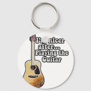 I'm nicer after playing the guitar. motivational key ring