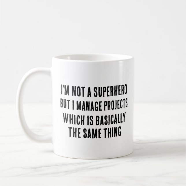 I'm not a superhero, but I manage projects, which  Coffee Mug (Left)