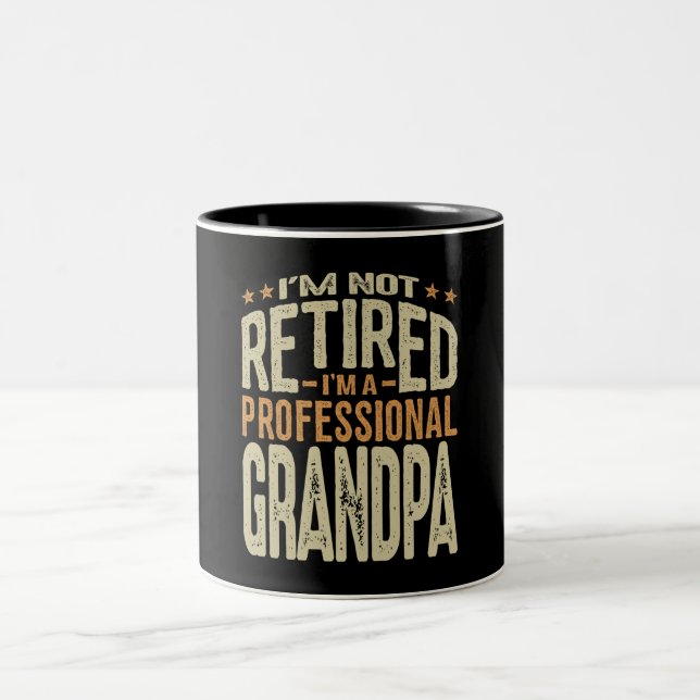 I'm Not Retired I'm a Professional Grandpa Two-Tone Coffee Mug (Center)