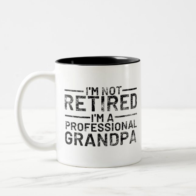 I'm Not Retired I'm A Professional Grandpa Two-Tone Coffee Mug (Left)