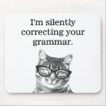 I'm silently correcting your grammar cat mousepad<br><div class="desc">I'm silently correcting your grammar cat mousepad. Funny cat photograph mouse pad design with humourous grammar police slogan. Cute gift idea for cat lover / cat person / pet owner and school teacher. (elementary / grammar / high school ) Education humour with geeky animal. Black and white kitten wearing nerdy...</div>