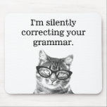 I'm silently correcting your grammar cat mousepad<br><div class="desc">I'm silently correcting your grammar cat mousepad. Funny cat photograph mouse pad design with humourous grammar police slogan. Cute gift idea for cat lover / cat person / pet owner and school teacher. (elementary / grammar / high school ) Education humour with geeky animal. Black and white kitten wearing nerdy...</div>