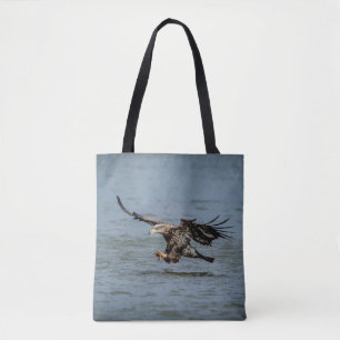Immature Bald Eagle diving for a fish Tote Bag