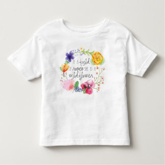 In A Field of Roses, She is a Wildflower T-Shirt