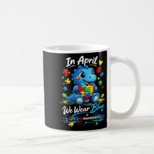 In april we wear blue autism awareness dinosaur coffee mug