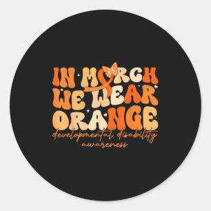 In march wear orange developmental disability classic round sticker