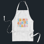 In My Auntie Era I Standard Apron<br><div class="desc">Fun design, perfect for any new auntie. Awesome way to announce a pregnancy to your sister! 'In My Auntie Era' fun quote for a woman who already loves her nephews and nieces to wear daily. Are you an awesome aunt? Accentuate your style with this groovy art! Give this to your...</div>