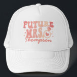 In My Engaged Era Engagement Gift Custom Fiance Trucker Hat<br><div class="desc">Introducing our "In My Engaged Era" Custom Fiance Trucker Hat – a chic and trendy accessory that's perfect for the bride-to-be. This personalised hat is not just a fashion statement but also a thoughtful engagement gift, capturing the essence of the engaged era. Featuring a cool wavy retro text and the...</div>