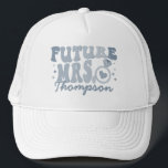 In My Engaged Era Engagement Gift Custom Fiance Trucker Hat<br><div class="desc">Elevate your engagement celebration with our "In My Engaged Era" Custom Fiance Trucker Hat. This trendy and cool accessory is the perfect personalised gift for the bride-to-be, adding a touch of retro style to her bridal shower or bachelorette party. The hat features wavy retro text, creating a unique and fashionable...</div>