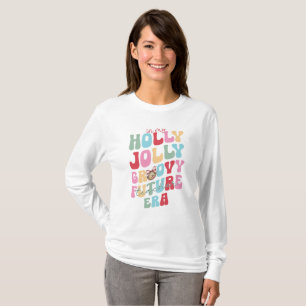 In my Holly Jolly Groovy Future Teacher Era T-Shirt