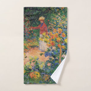 In The Garden by Claude Monet Hand Towel