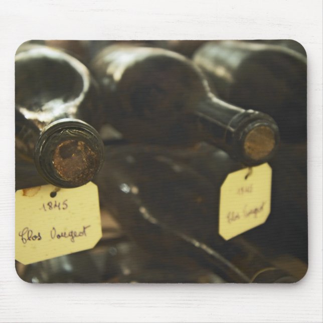 In the underground wine cellar: lying bottles in mouse pad (Front)