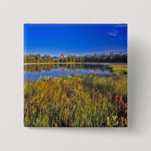 Index Peak reflects into Mud Lake on the 15 Cm Square Badge