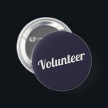 Indigo Blue Pin-back Volunteer Buttons<br><div class="desc">Bright indigo blue "Volunteer" buttons for volunteers,  teachers,  guides,  event organizers for special events,  such as weddings,  craft fairs,  home & garden shows,  charitable events,  business and corporate functions. Retro style,  pale ivory typography gives this button an elegant look. Easy to customise!</div>