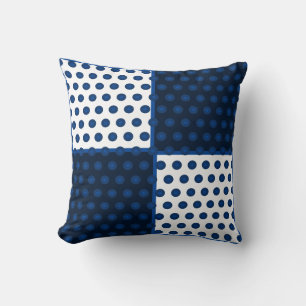 Indigo blues spots on blue and white cushion