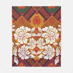 Indonesian batik motifs with very distinct plant a fleece blanket