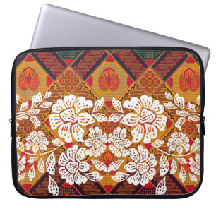 Indonesian batik motifs with very distinct plant a laptop sleeve