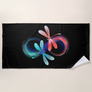 Infinity with glowing dragonflies beach towel
