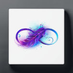 Infinity with Purple Feather Plaque<br><div class="desc">Infinity symbol with a beautiful feather painted in purple and blue bright colours on white background.</div>