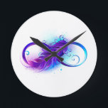 Infinity with Purple Feather Round Clock<br><div class="desc">Infinity symbol with a beautiful feather painted in purple and blue bright colors on white background.</div>