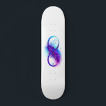 Infinity with Purple Feather Skateboard<br><div class="desc">Infinity symbol with a beautiful feather painted in purple and blue bright colours on white background.</div>