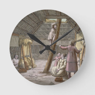 Inside a house in Alaska (colour engraving) Round Clock