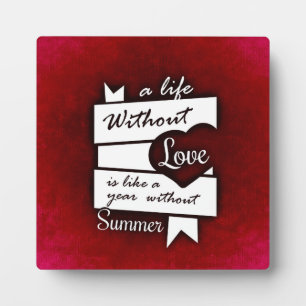 Inspirational Quote on Love on a Red Background Plaque