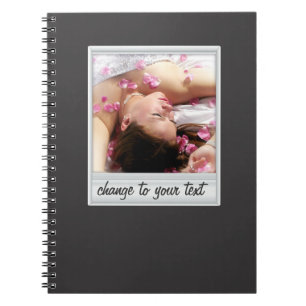 instant photo - photoframe - on black notebook
