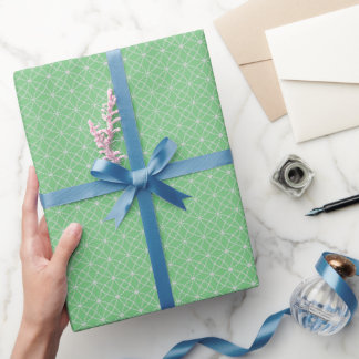Interlocking Curves on Light Green Wrapping Paper