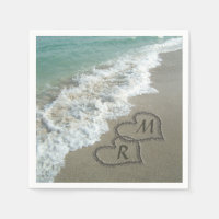 Interlocking Hearts on Beach Sand