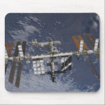 International Space Station in orbit Mouse Pad<br><div class="desc">International Space Station in orbit above the Earth featured with Terra.</div>