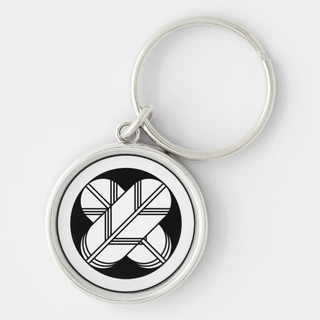 Intersecting hawk feathers in circle key ring (Front)