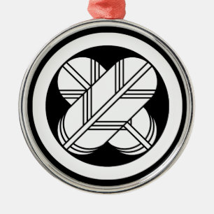 Intersecting hawk feathers in circle metal tree decoration