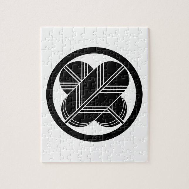 Intersecting hawk feathers with foot in circle jigsaw puzzle (Vertical)