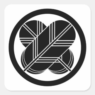 Intersecting hawk feathers with foot in circle square sticker