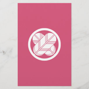 Intersecting hawk feathers with foot in circle stationery