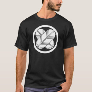 Intersecting hawk feathers with foot in circle T-Shirt
