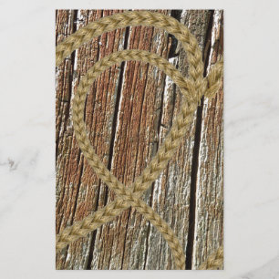 Intertwined hearts tangled rope romantic wooden