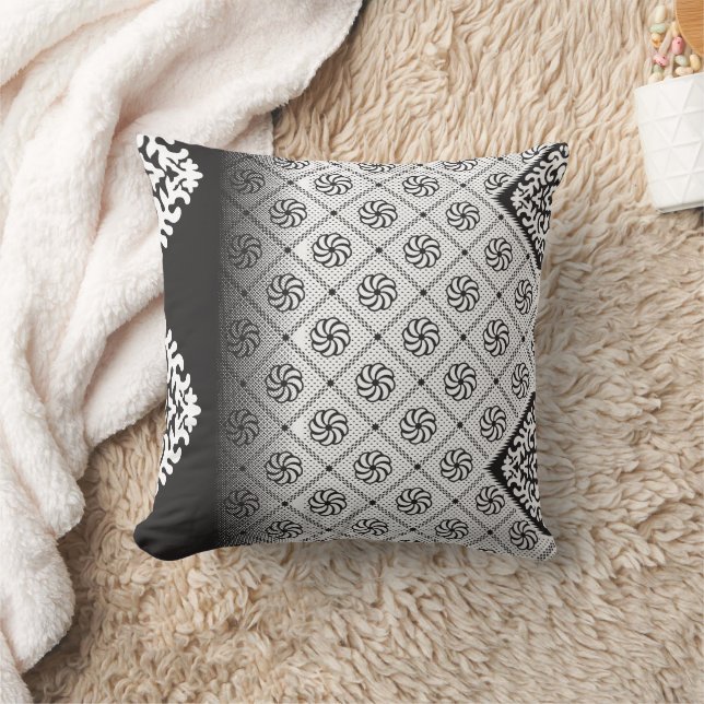 Intricate black and white pattern featuring floral cushion (Blanket)