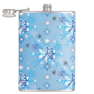 Intricate blue and white stars and snowflakes hip flask