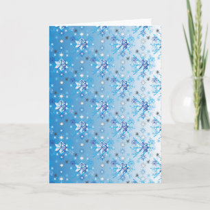 Intricate blue and white stars and snowflakes holiday card